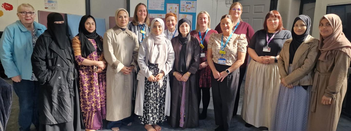 A group of people looking at the camera