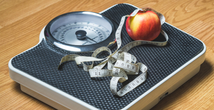 Measuring tape on some weight scales