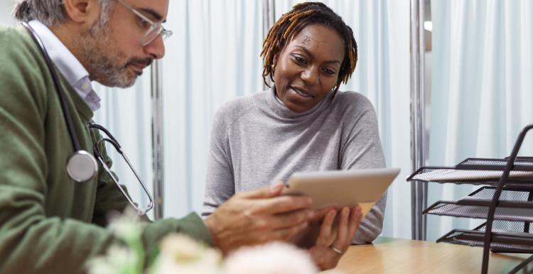 A doctor talking to a woman