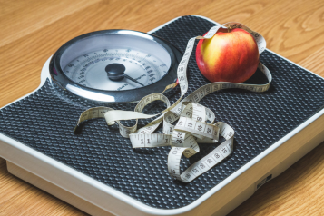 Measuring tape on some weight scales