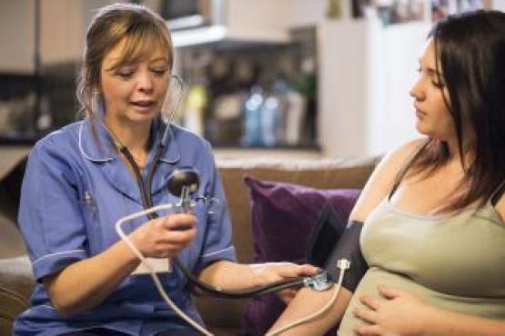 woman talking to midwife