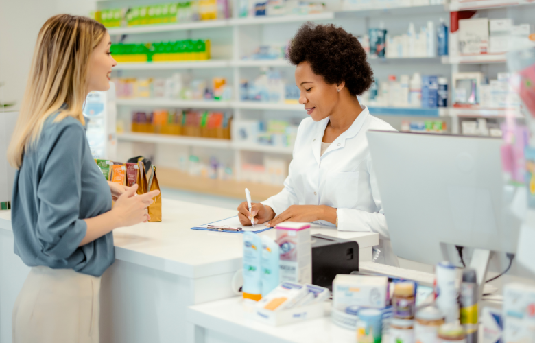 Woman being served in a pharmacy